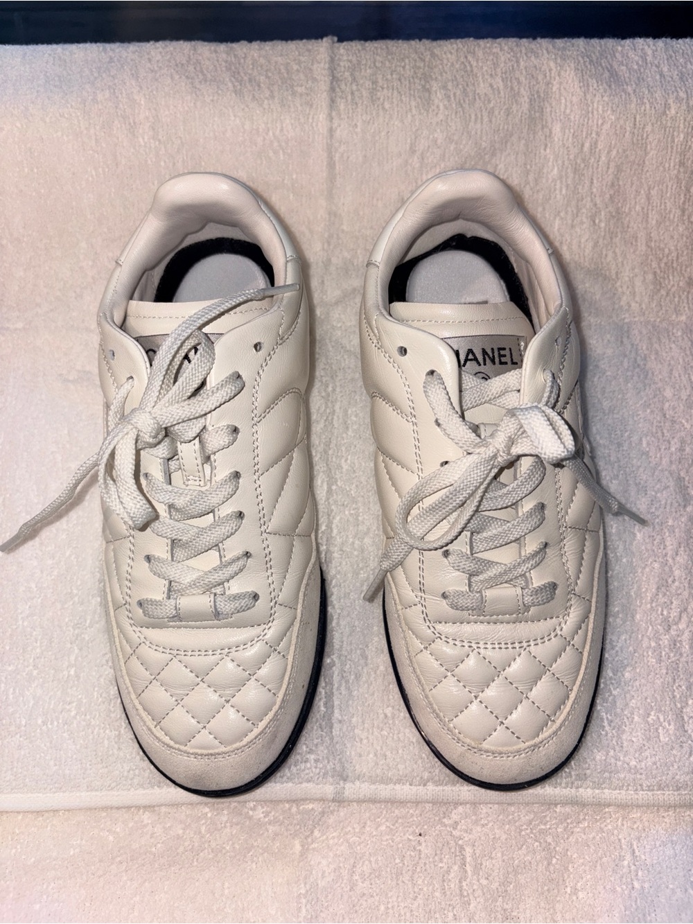 CHANEL White Quilted Leather Lace-Up Sneakers